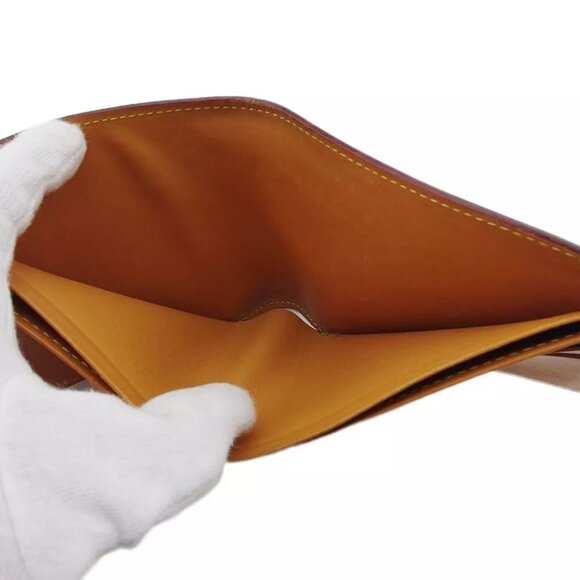 LOUIS VUITTON Bifold Billfold Nomad Taba() Leather Authentic Used - Picture 8 of 11